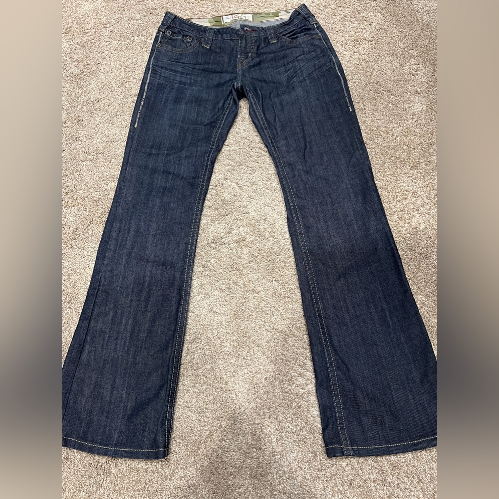 1921 slight bootcut jean, decorative stitching on rear pockets, size 28